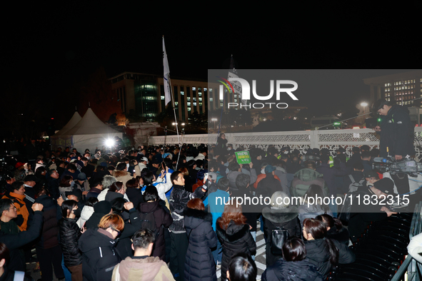 Hundreds of citizens gather in front of the National Assembly in Seoul, South Korea, on December 4, 2024, demanding the repeal of the martia...