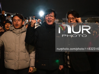 Hundreds of citizens gather in front of the National Assembly in Seoul, South Korea, on December 4, 2024, demanding the repeal of the martia...