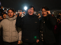 Hundreds of citizens gather in front of the National Assembly in Seoul, South Korea, on December 4, 2024, demanding the repeal of the martia...