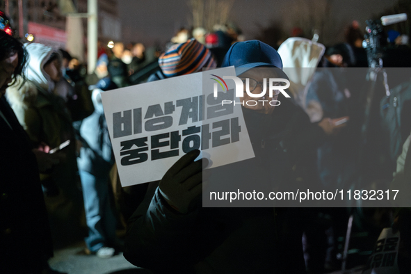 Hundreds of citizens gather in front of the National Assembly in Seoul, South Korea, on December 4, 2024, demanding the repeal of the martia...