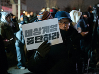 Hundreds of citizens gather in front of the National Assembly in Seoul, South Korea, on December 4, 2024, demanding the repeal of the martia...