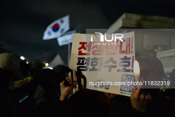 Hundreds of citizens gather in front of the National Assembly in Seoul, South Korea, on December 4, 2024, demanding the repeal of the martia...