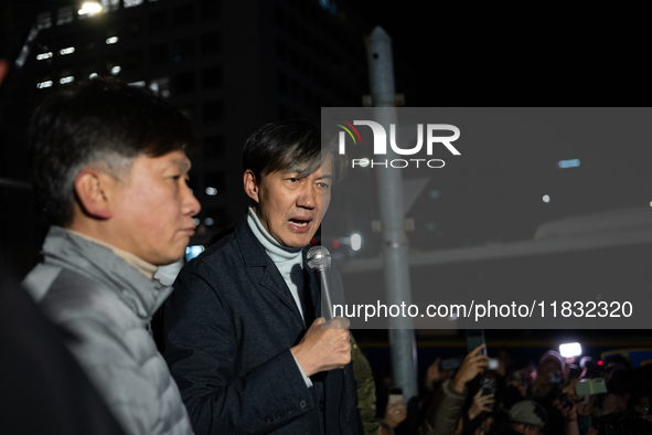 Cho Kuk, the leader of the Rebuilding Korea Party, stands in front of the National Assembly to address citizens about the emergency martial...