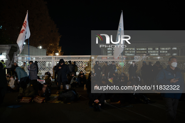 Hundreds of citizens gather in front of the National Assembly in Seoul, South Korea, on December 4, 2024, demanding the repeal of the martia...