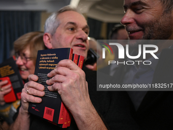 KRAKOW, POLAND - DECEMBER 3:   
Members of the public queue to meet Szymon Holownia, the current Marshal of the Polish Sejm (Speaker of the...