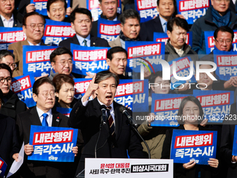 Cho Kuk, the leader of the Rebuilding Korea Party, delivers a speech at an opposition coalition rally in front of the National Assembly in Y...