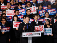 Lee Jae-myung, leader of the Democratic Party of Korea, delivers a speech at an opposition coalition rally in front of the National Assembly...