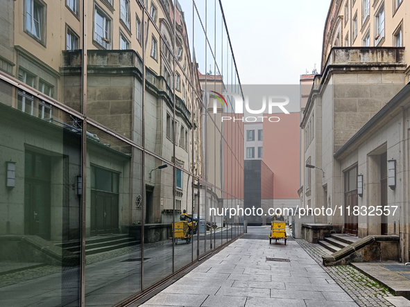 A DHL postman is in Dresden, Saxony, Germany, on March 19, 2022. Due to a new draft law, consumers have to wait longer for a letter in the f...