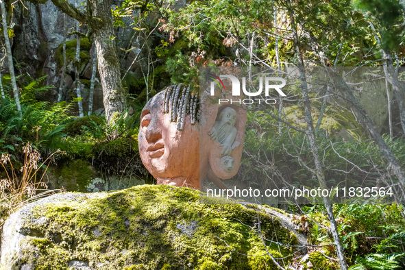 A general view of the Trollparken Garpes Vanner sculpture park is seen in Gamleby, Sweden, on August 11, 2024. The artist Jerzy Przybyl, als...