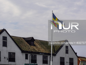 The Swedish flag is in front of the Naval Museum building (Marinmuseum) in Karlskrona, Sweden, on August 15, 2024. (