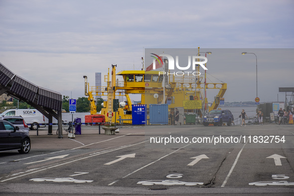 A free yellow ferry connecting the main island on the Karlskrona archipelago is seen in Karlskrona, Sweden, on August 15, 2024. 