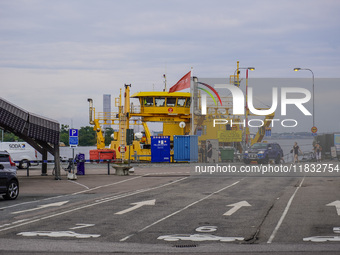 A free yellow ferry connecting the main island on the Karlskrona archipelago is seen in Karlskrona, Sweden, on August 15, 2024. (