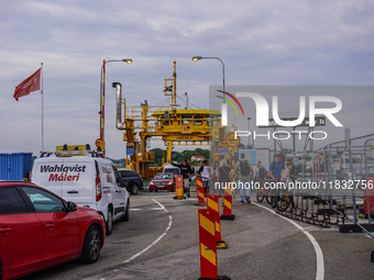 A free yellow ferry connecting the main island on the Karlskrona archipelago is seen in Karlskrona, Sweden, on August 15, 2024. (