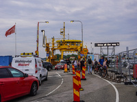 A free yellow ferry connecting the main island on the Karlskrona archipelago is seen in Karlskrona, Sweden, on August 15, 2024. (