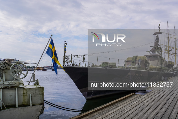 Navy vessels sit in the port in front of the Naval Museum in Karlskrona, Sweden, on August 15, 2024. 