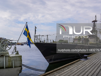 Navy vessels sit in the port in front of the Naval Museum in Karlskrona, Sweden, on August 15, 2024. (