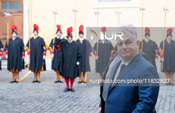 Hungary's Prime Minister Viktor Orban arrives for a meeting with Pope Francis at The Vatican, on December 4, 2024. 