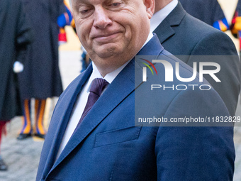 Hungary's Prime Minister Viktor Orban arrives for a meeting with Pope Francis at The Vatican, on December 4, 2024. (