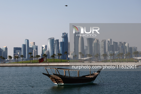 A view of the city and a wooden boat in Doha, Qatar on December 3, 2024. 