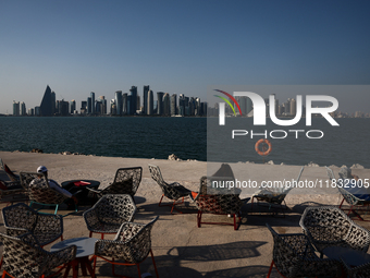 A view of the city, Doha Bay and outdoor cafe in Doha, Qatar on December 3, 2024. (