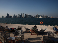 A view of the city, Doha Bay and outdoor cafe in Doha, Qatar on December 3, 2024. (