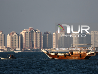 A wooden boat is seen at Doha Bay in Doha, Qatar on December 3, 2024. (