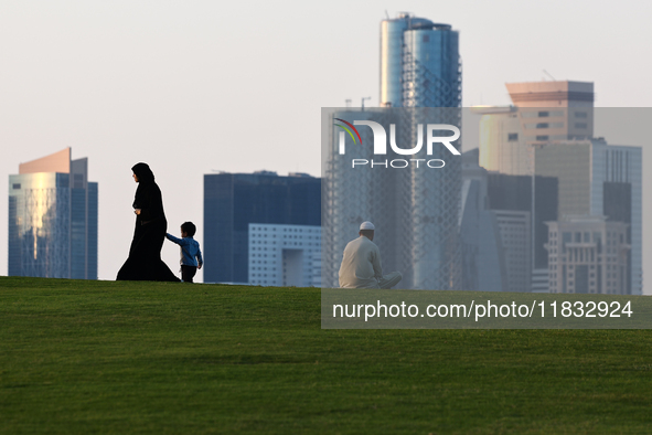 People are seen at mound-skyline view point in Doha, Qatar on December 3, 2024. 