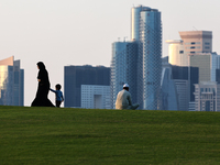 People are seen at mound-skyline view point in Doha, Qatar on December 3, 2024. (