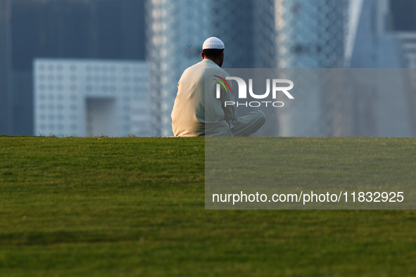 A man is seen at mound-skyline view point in Doha, Qatar on December 3, 2024. 