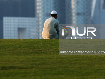 A man is seen at mound-skyline view point in Doha, Qatar on December 3, 2024. (