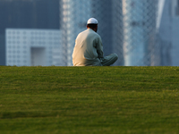 A man is seen at mound-skyline view point in Doha, Qatar on December 3, 2024. (