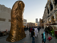 A view of the Golden Thumb Statue at the Souq Waqif in Doha, Qatar on December 3, 2024. (