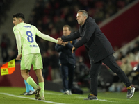 Pedri central midfield of Barcelona and Spain and Hansi Flick head coach of Barcelona during the La Liga match between RCD Mallorca and FC B...