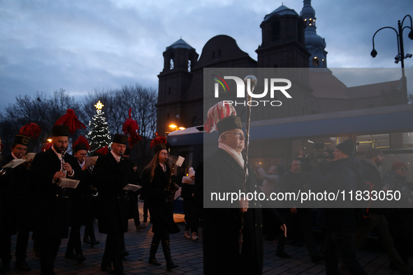 In Nikiszowiec, Poland, on December 4, 2024, the miners' orchestra walks through the streets of the city, traditionally waking up residents...