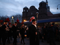 In Nikiszowiec, Poland, on December 4, 2024, the miners' orchestra walks through the streets of the city, traditionally waking up residents...