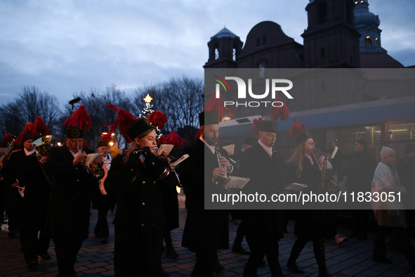 In Nikiszowiec, Poland, on December 4, 2024, the miners' orchestra walks through the streets of the city, traditionally waking up residents...