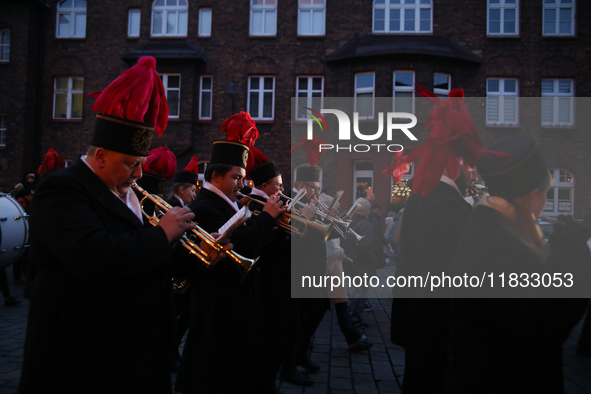 In Nikiszowiec, Poland, on December 4, 2024, the miners' orchestra walks through the streets of the city, traditionally waking up residents...