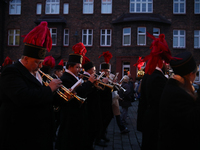 In Nikiszowiec, Poland, on December 4, 2024, the miners' orchestra walks through the streets of the city, traditionally waking up residents...