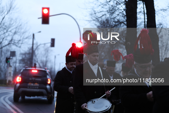 In Nikiszowiec, Poland, on December 4, 2024, the miners' orchestra walks through the streets of the city, traditionally waking up residents...