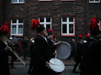 In Nikiszowiec, Poland, on December 4, 2024, the miners' orchestra walks through the streets of the city, traditionally waking up residents...