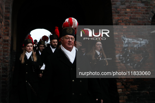 In Nikiszowiec, Poland, on December 4, 2024, the miners' orchestra walks through the streets of the city, traditionally waking up residents...