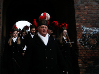 In Nikiszowiec, Poland, on December 4, 2024, the miners' orchestra walks through the streets of the city, traditionally waking up residents...