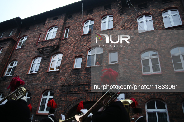 In Nikiszowiec, Poland, on December 4, 2024, the miners' orchestra walks through the streets of the city, traditionally waking up residents...