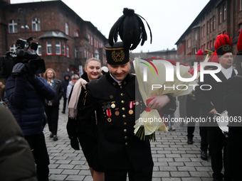 Miner Mariusz proposes unexpectedly during the traditional waking up of residents in Barborka in Nikiszowiec, Poland, on December 4, 2024. B...