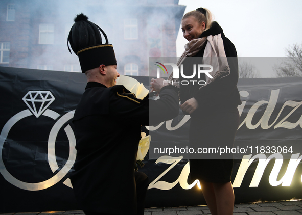 Miner Mariusz proposes unexpectedly during the traditional waking up of residents in Barborka in Nikiszowiec, Poland, on December 4, 2024. B...