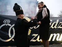 Miner Mariusz proposes unexpectedly during the traditional waking up of residents in Barborka in Nikiszowiec, Poland, on December 4, 2024. B...