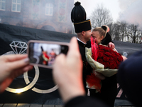 Miner Mariusz proposes unexpectedly during the traditional waking up of residents in Barborka in Nikiszowiec, Poland, on December 4, 2024. B...