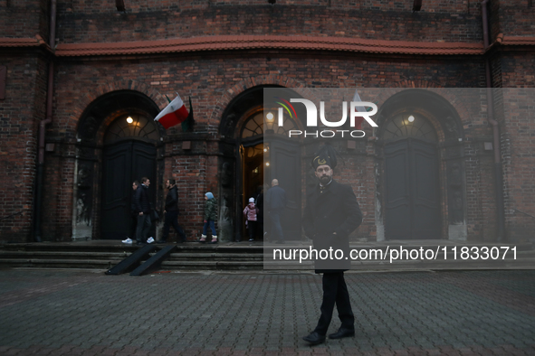 A miner participates in the traditional waking up of residents during Barborka in Nikiszowiec, Poland, on December 4, 2024. Barborka is a tr...