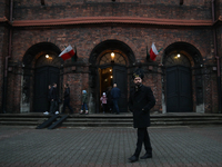 A miner participates in the traditional waking up of residents during Barborka in Nikiszowiec, Poland, on December 4, 2024. Barborka is a tr...