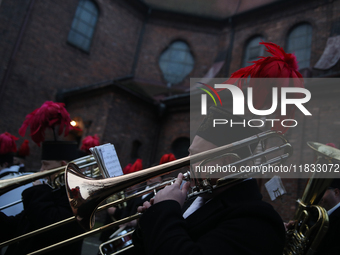 In Nikiszowiec, Poland, on December 4, 2024, the miners' orchestra walks through the streets of the city, traditionally waking up residents...